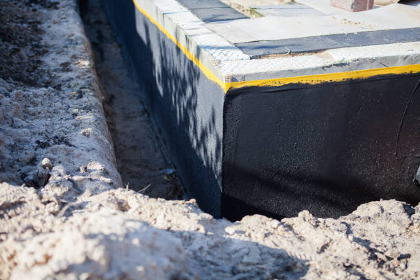 Professional Waterproofing technician working in Battle Ground, IN